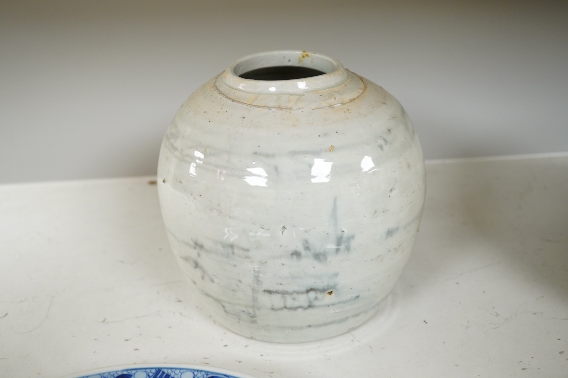 A 19th Century Chinese blue and white ‘precious objects’ plate, a jar and famille rose saucer, largest 23cm in diameter